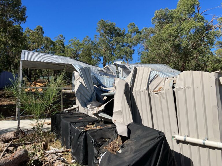 Emergency make safe work securing a damaged property after a storm.