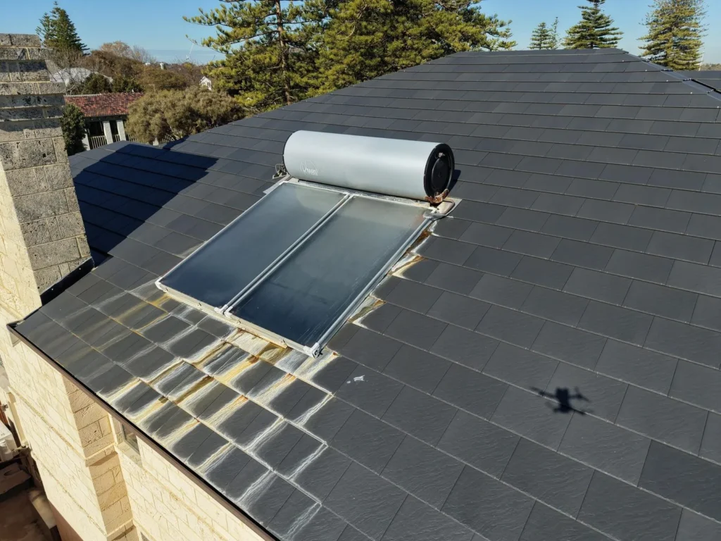 Staining on tiles below a solar hot water unit, wider drone view